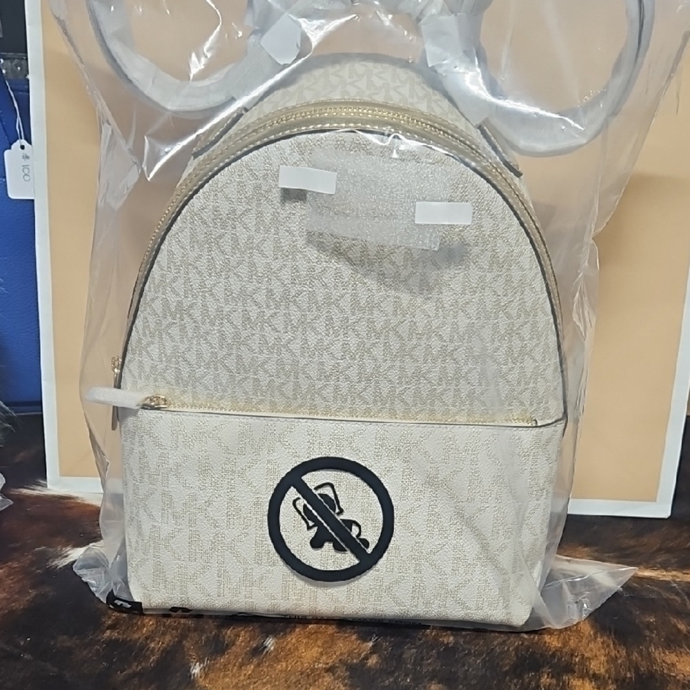 Beige Monogram Backpack with Black Accent